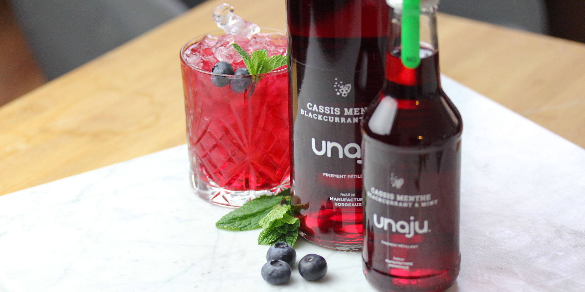 perspective bouteille de jus de cassis